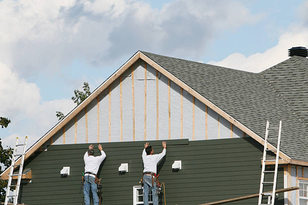 Professional Siding Installation technician working in Golf, IL